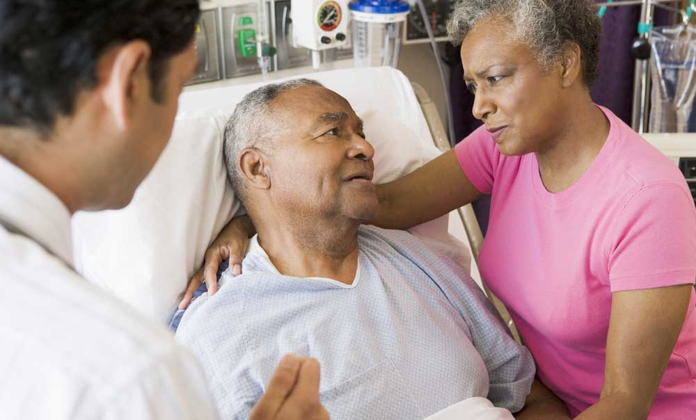Doctor listening to patient